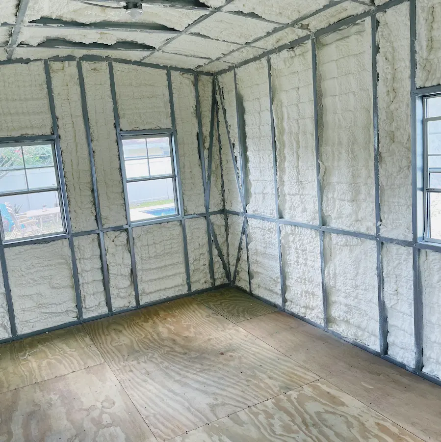 Closed-cell spray foam insulation applied to wall cavities in a residential project in Odessa